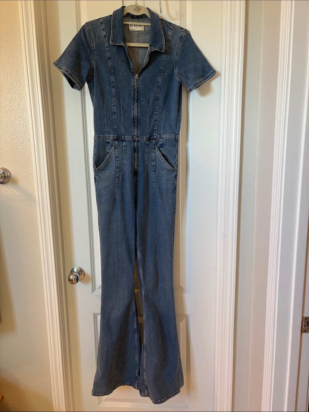 We The Free Denim Zip-Front Bootcut Jumpsuit in Medium Blue